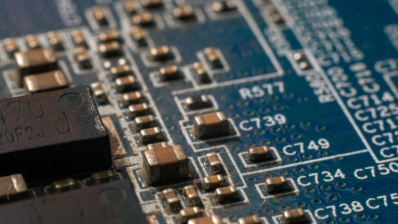 Offerings Detailed macro shot of a circuit board highlighting electronic components and traces.
